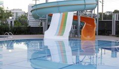 Фото купить продать недорогую квартиру недвижимость в доме жилом комплексе с открытым бассейном Алан
