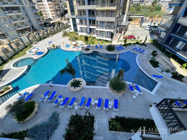 Продается квартира 1+1 без мебели в Махмутлар в комплексе Albimo Loft Residence Алания Анталия Турци