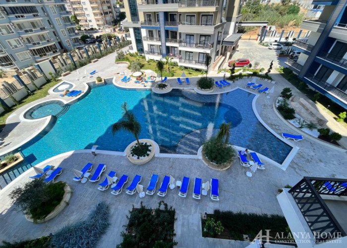 Продается квартира 1+1 без мебели в Махмутлар в комплексе Albimo Loft Residence Алания Анталия Турци