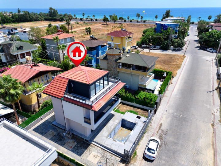 New 3+1 Triplex Villa 150 m from Sea in Konakli